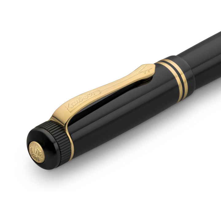 Kaweco DIA2 Fountain Pen - Black with Gold Trim — flat lay