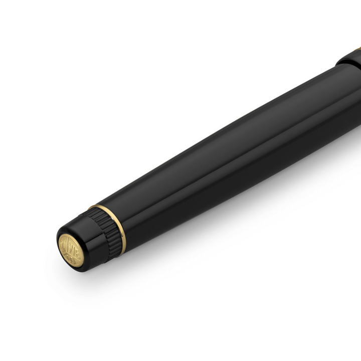 Kaweco DIA2 Fountain Pen - Black with Gold Trim — flat lay