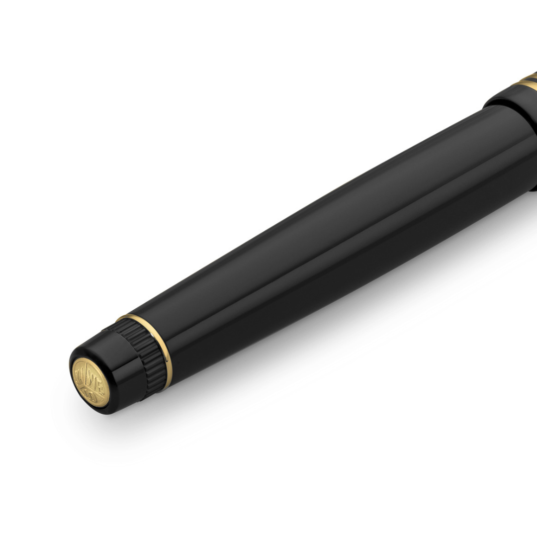 Kaweco DIA2 Rollerball Pen - Black with Gold Trim — flat lay