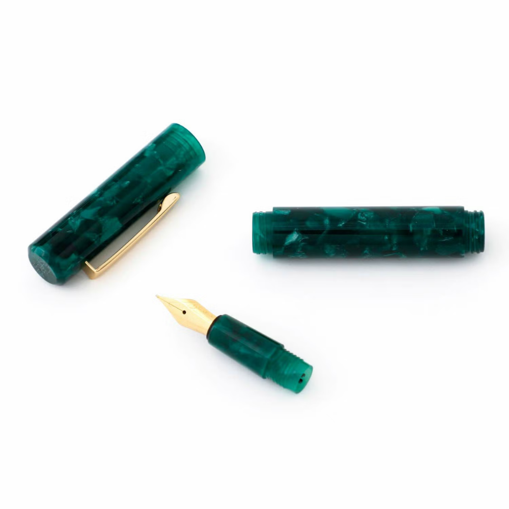 Hightide Attaché Marbled Fountain Pen - Green — writing at an angle