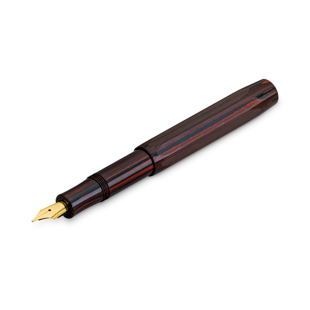 Kaweco EBONIT Sport 140 Years Anniversary Edition Fountain Pen Set — writing at an angle