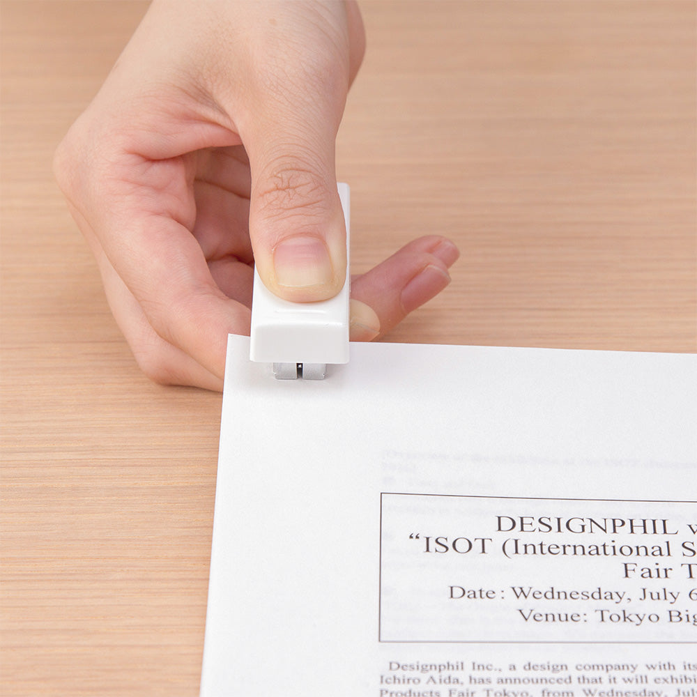 Midori XS Stapler White — in use