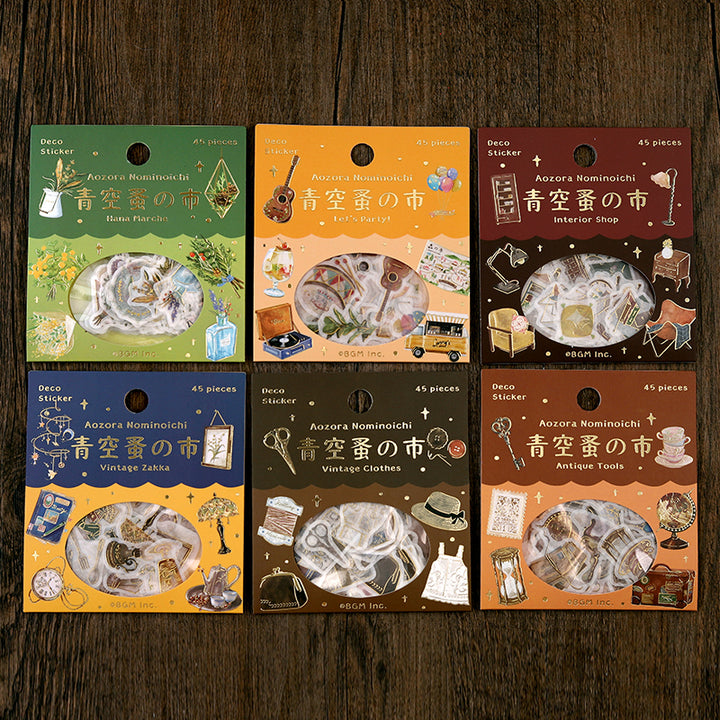 BGM Foil Stamping Flake Seal: The Flea Market of Blue Sky - Furniture store — close-up