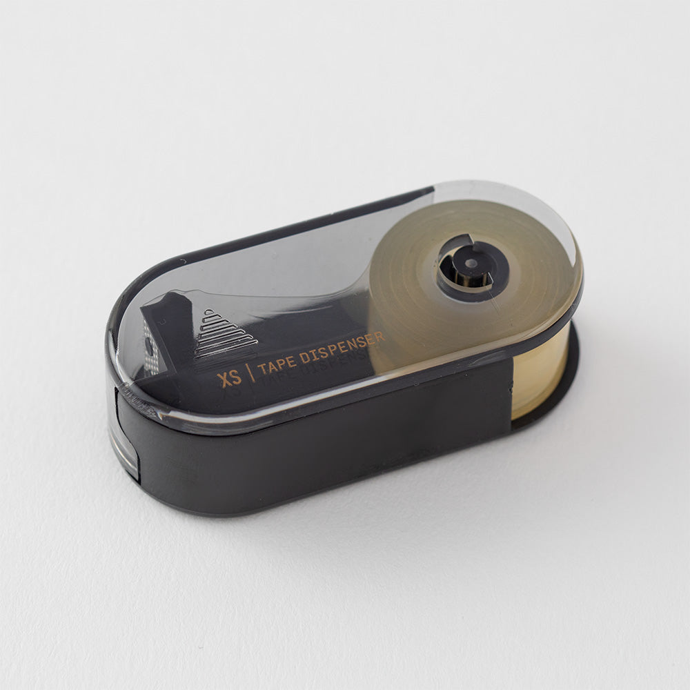 Midori XS Tape Cutter and Refill — close-up