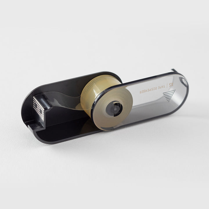 Midori XS Tape Cutter and Refill — close-up