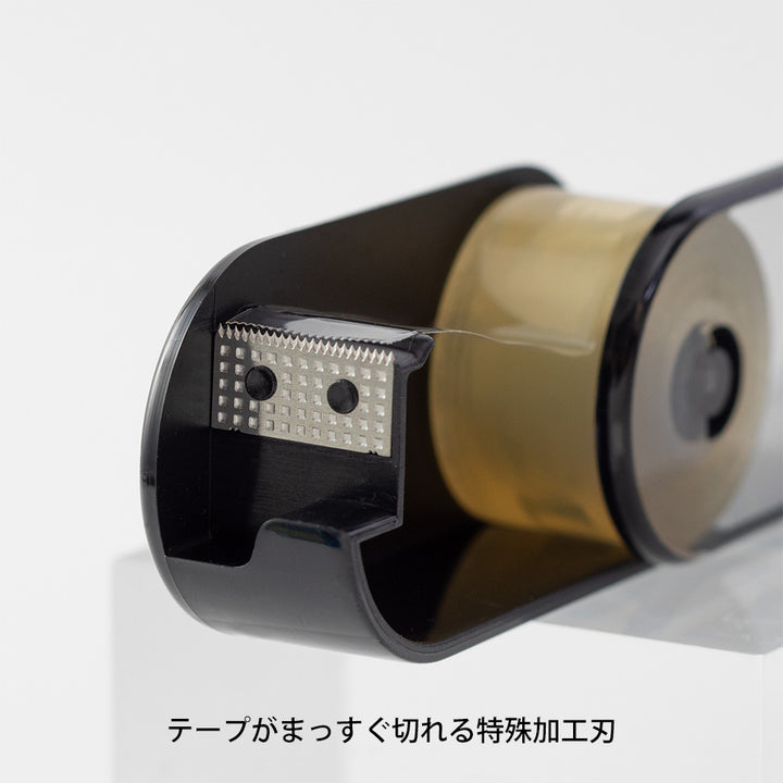 Midori XS Tape Cutter and Refill — close-up