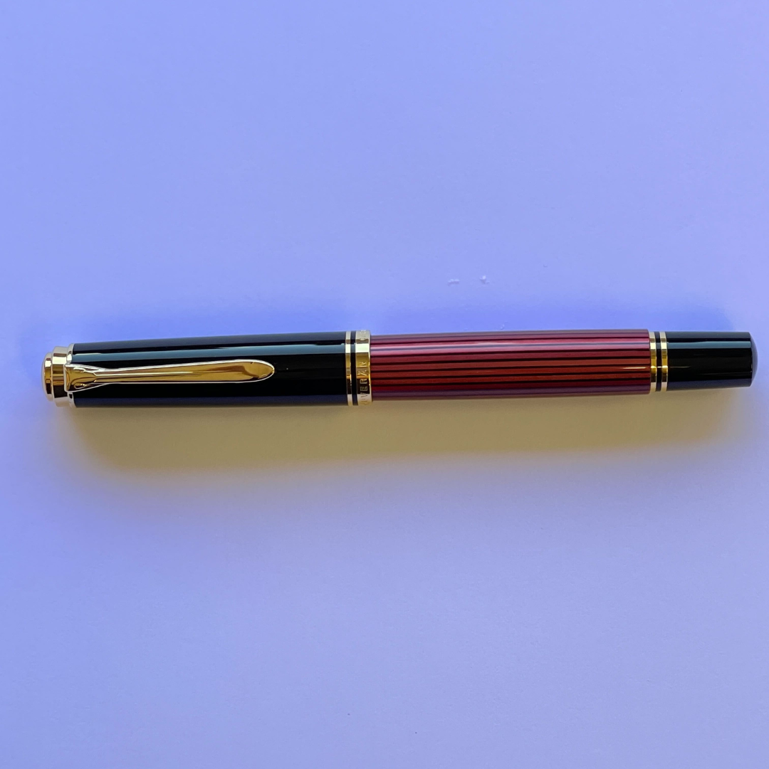 Pelikan Souveran M600 Fountain Pen - Black &amp; Red with Gold Trim (14K Gold) [Pre-Order] — flat lay