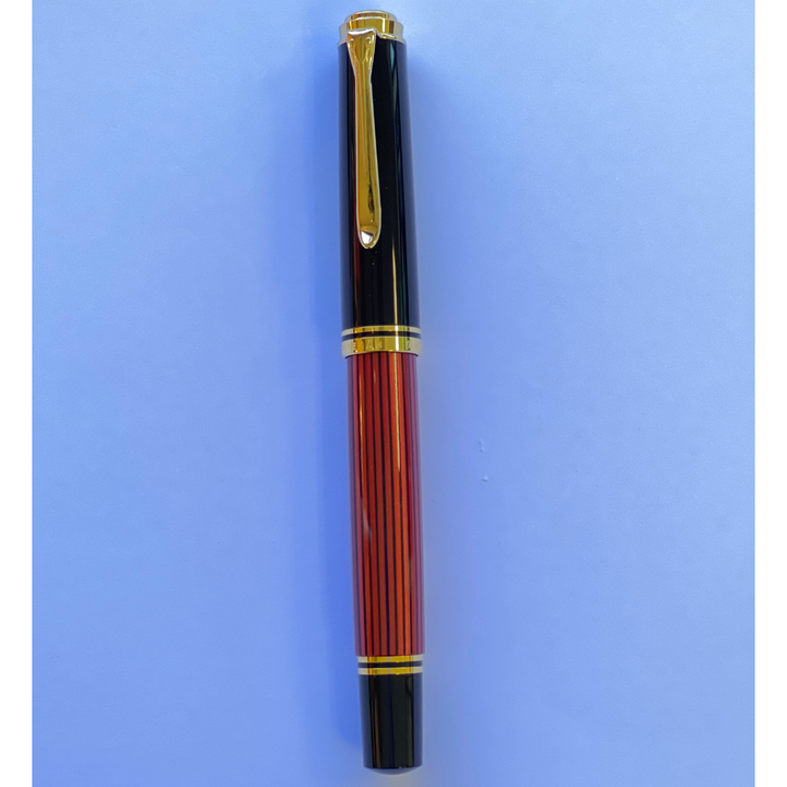 Pelikan Souveran M600 Fountain Pen - Black &amp; Red with Gold Trim (14K Gold) [Pre-Order] — flat lay