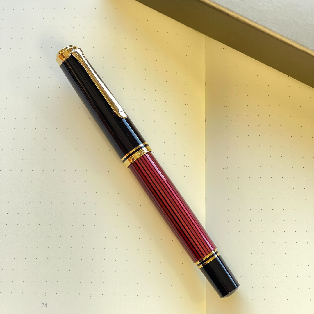 Pelikan Souveran M600 Fountain Pen - Black &amp; Red with Gold Trim (14K Gold) [Pre-Order] — flat lay