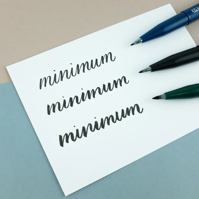 Pentel Brush Sign Pen Pigment - Black Ink — in use