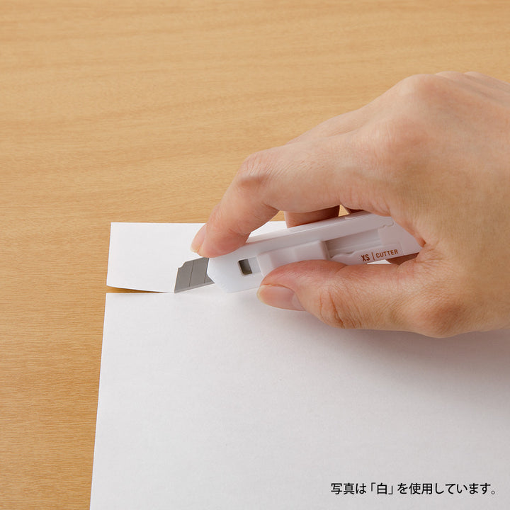 Midori XS Cutter — flat lay