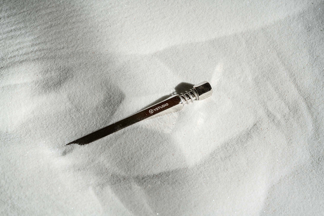 Ystudio Classic Revolve Ballpoint Pen Spring - Shiny Silver (Limited Edition) — writing at an angle