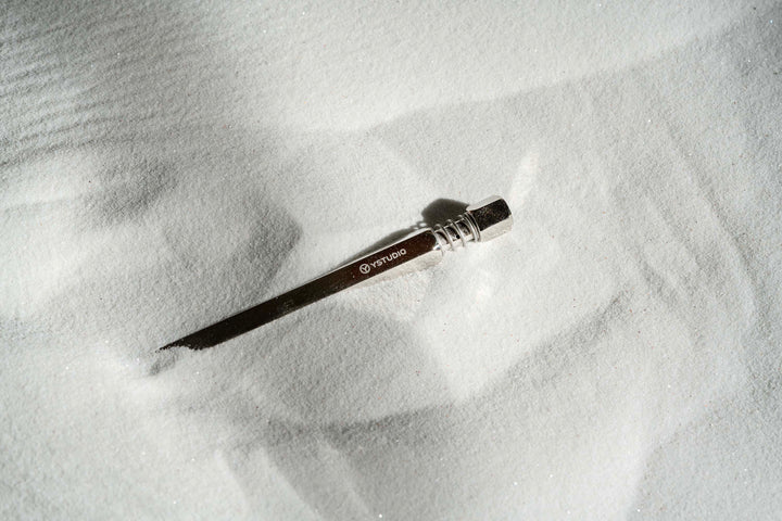 Ystudio Classic Revolve Ballpoint Pen Spring - Shiny Silver (Limited Edition) — writing at an angle