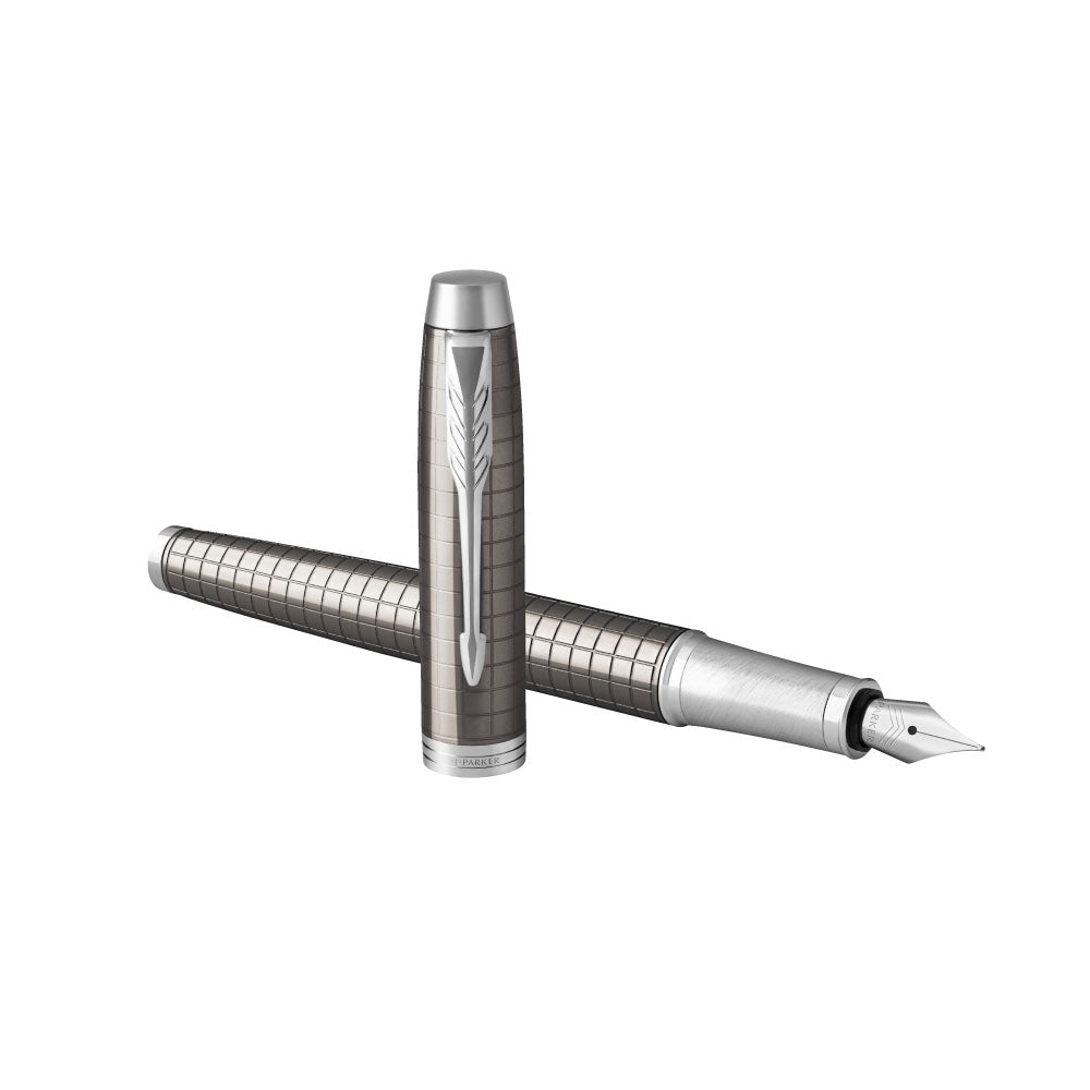 Parker IM Premium Fountain Pen - Dark Espresso with Chrome Trims — writing at an angle