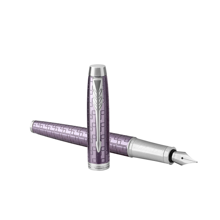 Parker IM Premium Fountain Pen - Dark Violet with Chrome Trims — writing at an angle
