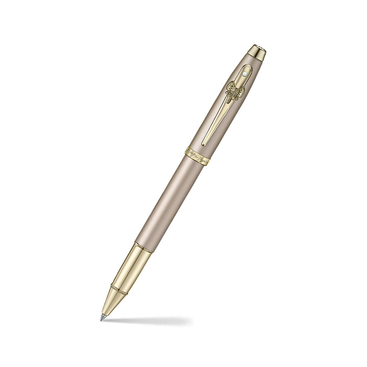 Sheaffer 100 Emily in Paris 9377 Champagne Gold Rollerball Pen with Champagne Gold Trims and Bow-Shaped Clip Emblem — Sheaffer rollerball pen — fluid gel ink writing instrument, at Cityluxe Singapore