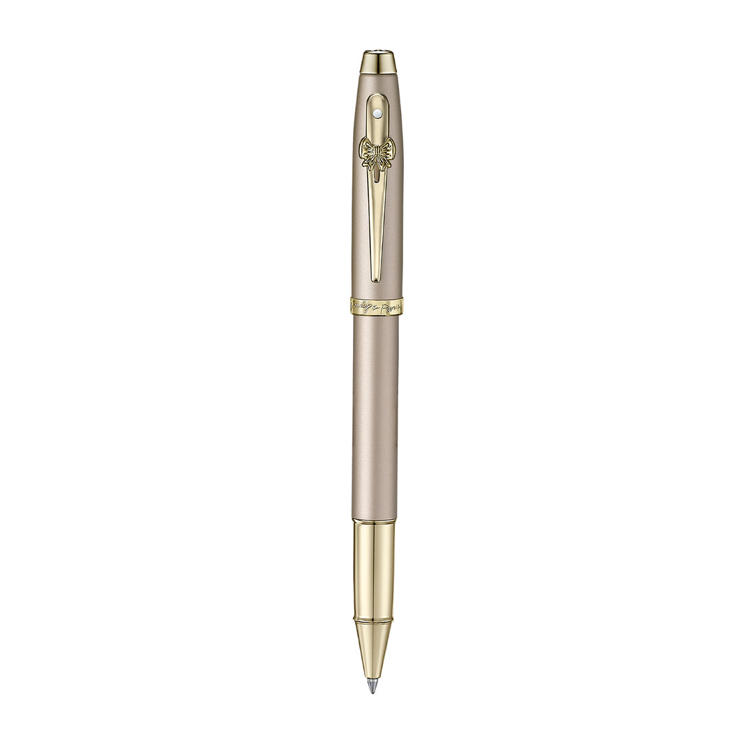 Sheaffer 100 Emily in Paris 9377 Champagne Gold Rollerball Pen with Champagne Gold Trims and Bow-Shaped Clip Emblem — Sheaffer rollerball pen — fluid gel ink writing instrument, at Cityluxe Singapore