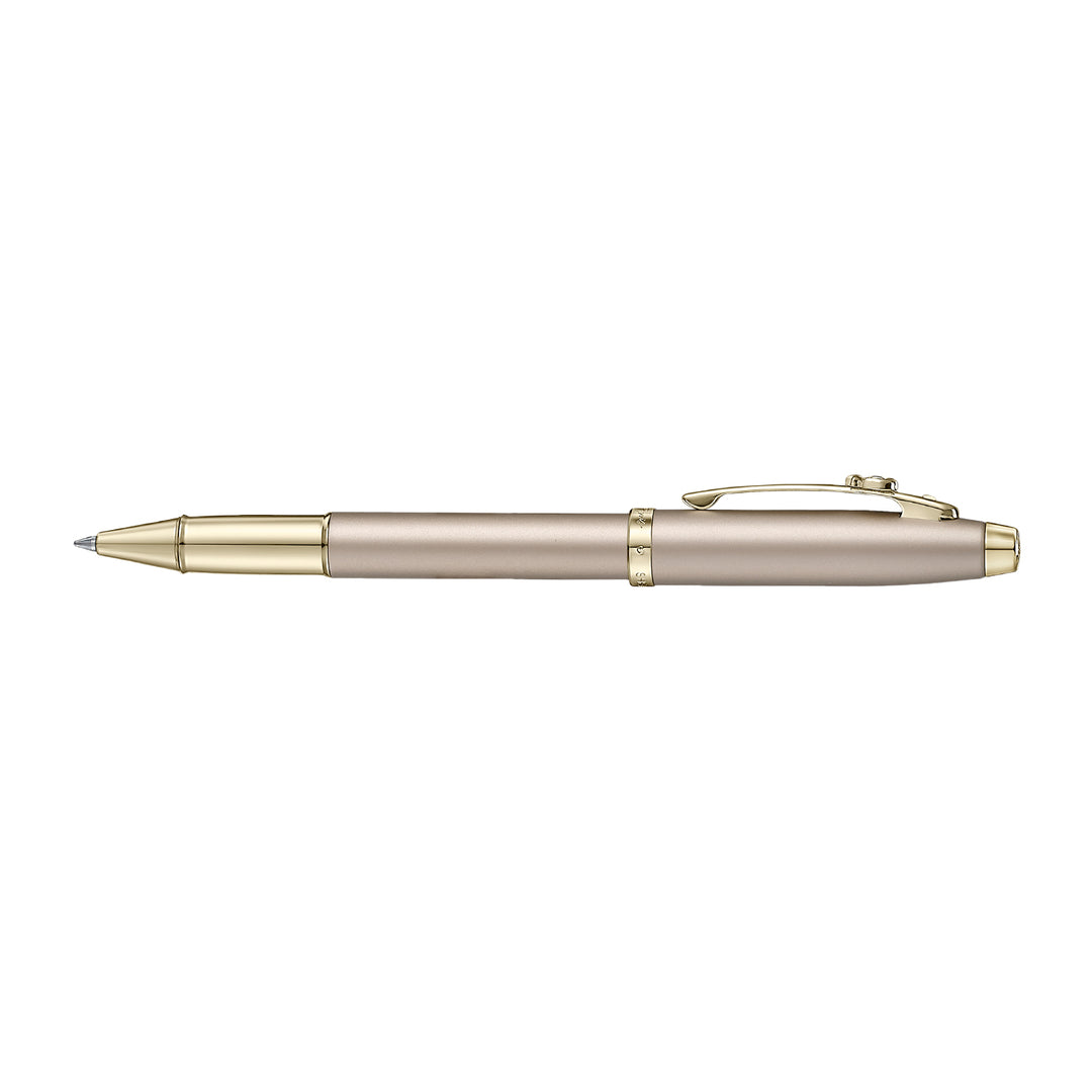 Sheaffer 100 Emily in Paris 9377 Champagne Gold Rollerball Pen with Champagne Gold Trims and Bow-Shaped Clip Emblem — Sheaffer rollerball pen — fluid gel ink writing instrument, at Cityluxe Singapore
