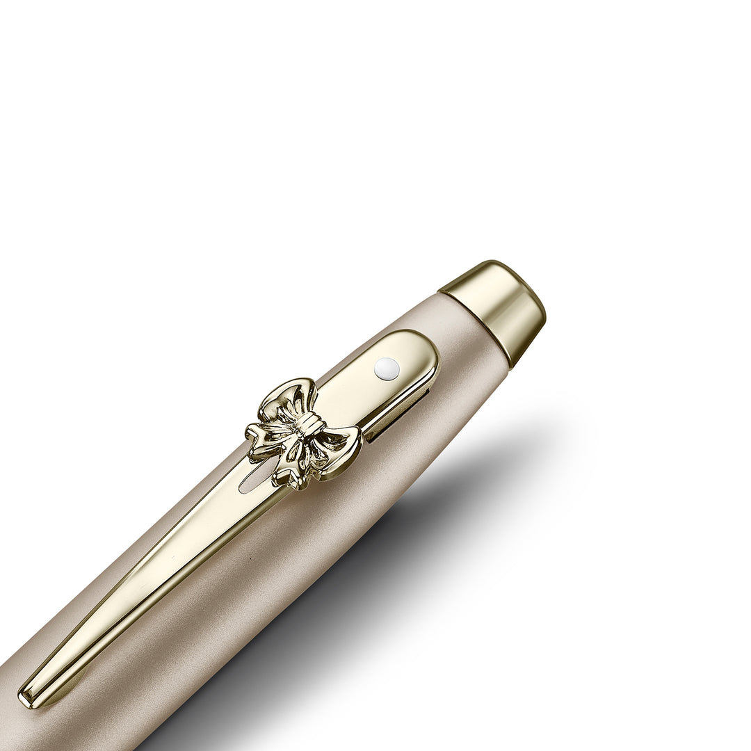 Sheaffer 100 Emily in Paris 9377 Champagne Gold Rollerball Pen with Champagne Gold Trims and Bow-Shaped Clip Emblem — Sheaffer rollerball pen — fluid gel ink writing instrument, at Cityluxe Singapore