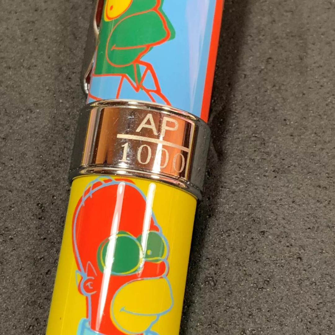 Acme Studio Homer Simpson Limited Edition Rollerball Pen — flat lay