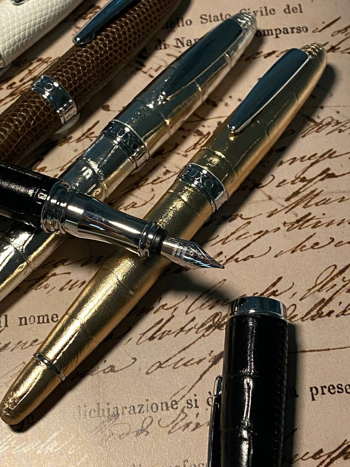 Luxo Limited Edition Leather Fountain Pen - Black (Fine Nib) — writing at an angle