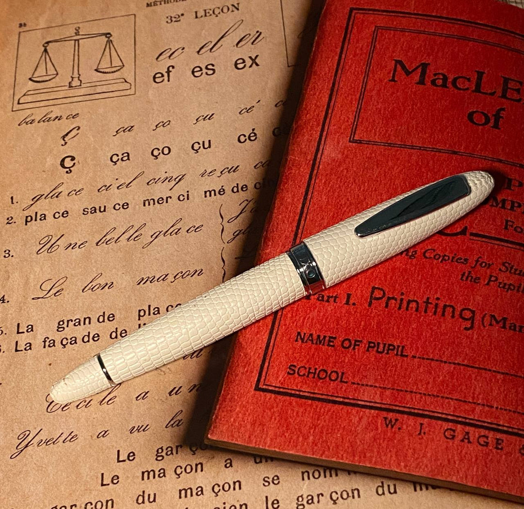 Luxo Limited Edition Leather Fountain Pen - Ivory (Fine Nib) — writing at an angle