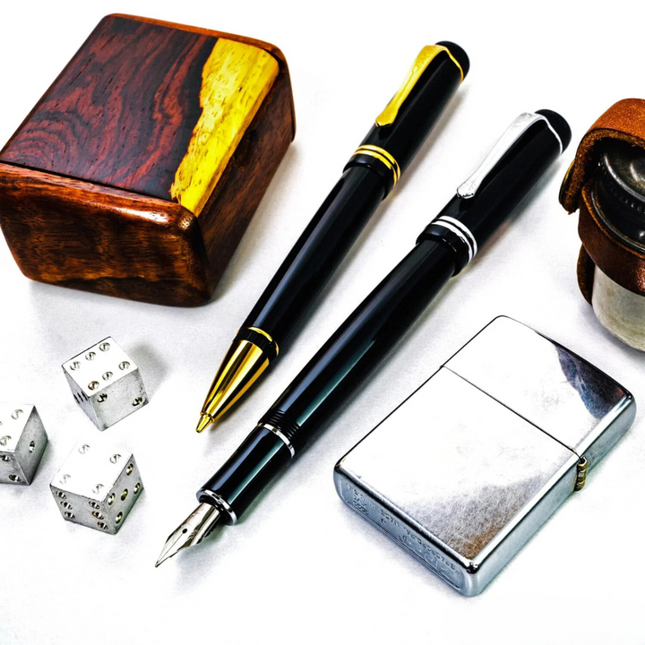 Kaweco DIA2 Rollerball Pen - Black with Gold Trim — flat lay
