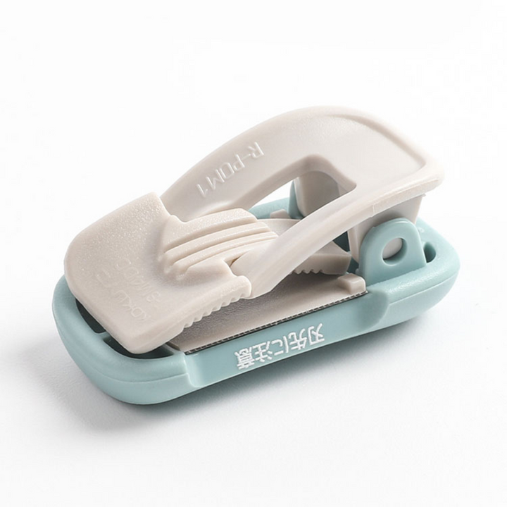 Kokuyo Me Clip-Type Tape Cutter (10-15mm) - Tofu White — with packaging