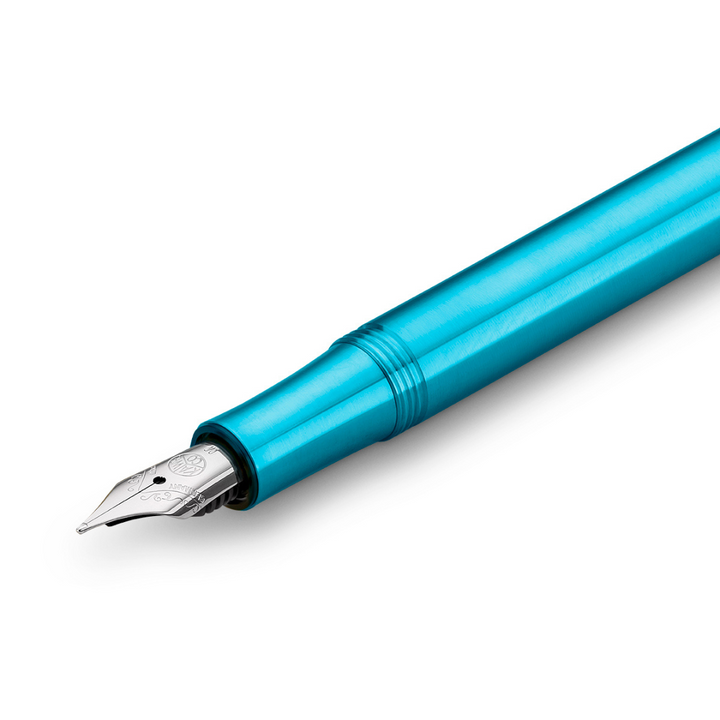Kaweco Collection Fountain Pen - Liliput Blue — writing at an angle