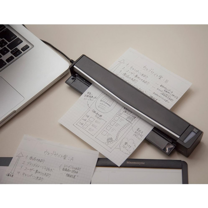 Maruman Mnemosyne Notepad Holder with 5 Pockets &amp; A4 Graph Notepad (Black) — in use
