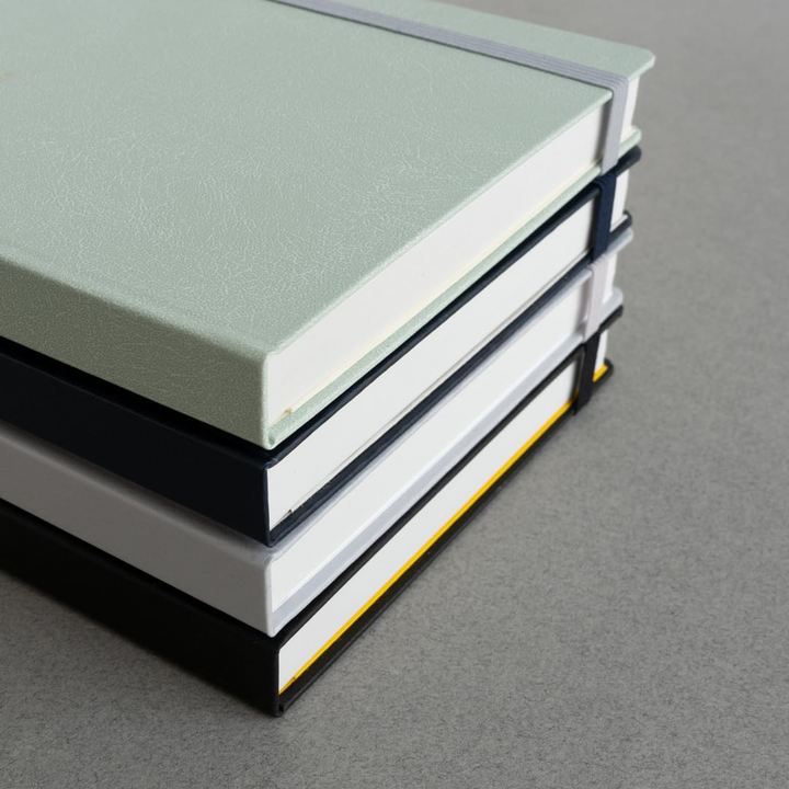 Maruman Mnemosyne A5 Journal Hardcover Notebook - Black — flat lay