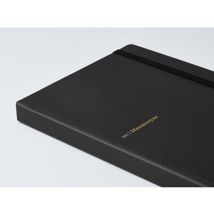 Maruman Mnemosyne A5 Journal Hardcover Notebook - Black — flat lay