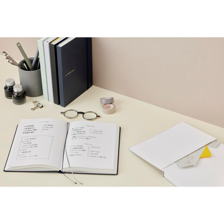 Maruman Mnemosyne A5 Journal Hardcover Notebook - Black — flat lay