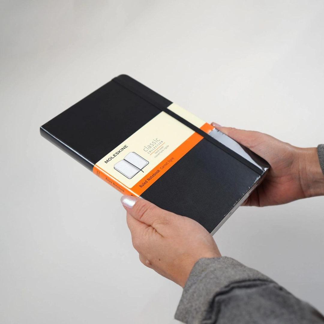 Moleskine Hardcover Classic Notebook - Ruled / Large / Black — flat lay