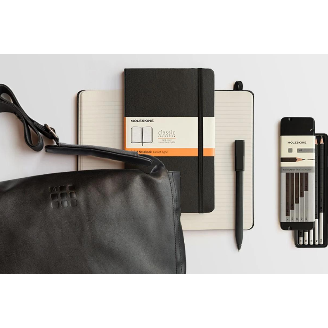 Moleskine Softcover Classic Notebook - Ruled / Large / Black — flat lay