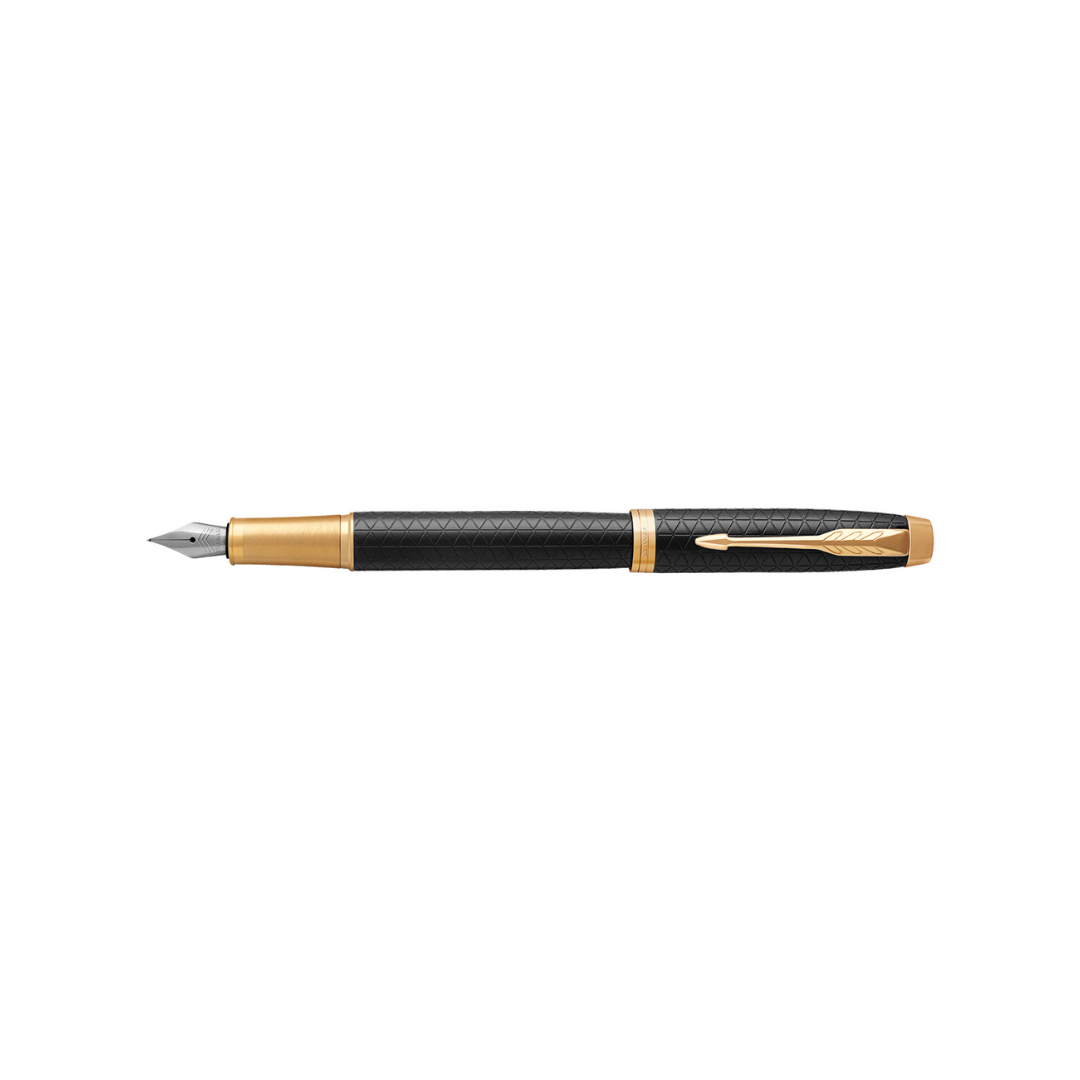 Parker IM Premium Fountain Pen - Black with Gold Trims — writing at an angle