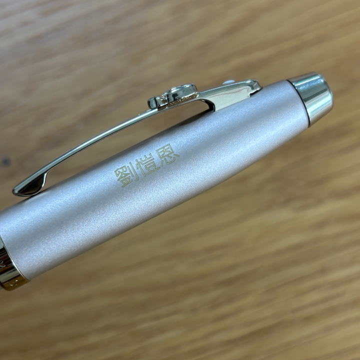 Personalised Chinese name engraving on Sheaffer Emily in Paris 100 E9377 Champagne Gold Finish Body and Trims with Bow Emblem Fountain Pen - Medium at Cityluxe WorkRoom