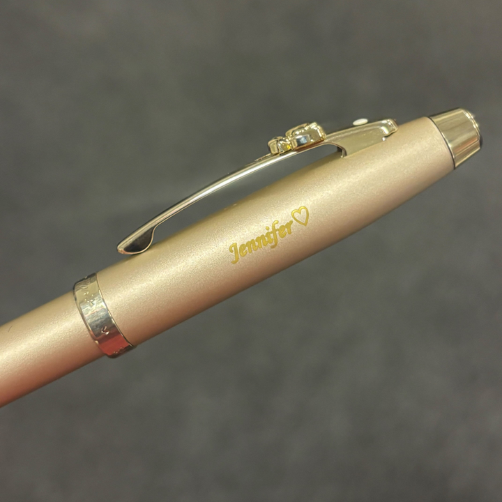 Personalized Name Engraving On Sheaffer 100 Emily in Paris 9377 Champagne Gold Ballpoint Pen with Champagne Gold Trims and Bow-Shaped Clip Emblem