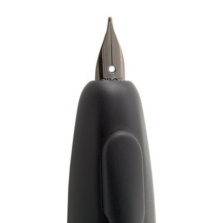 Pilot Capless Fountain Pen - Matte Black 18K Gold with Ion Plating — writing at an angle