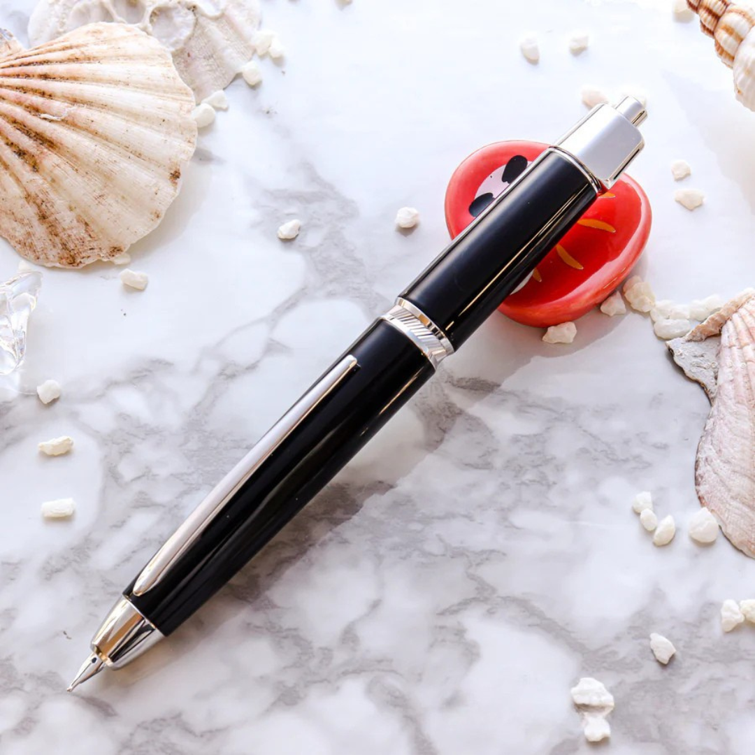 Pilot Vanishing Point Capless Luxury LS Fountain Pen - Black 18K Gold Rhodium-plated Nib — flat lay