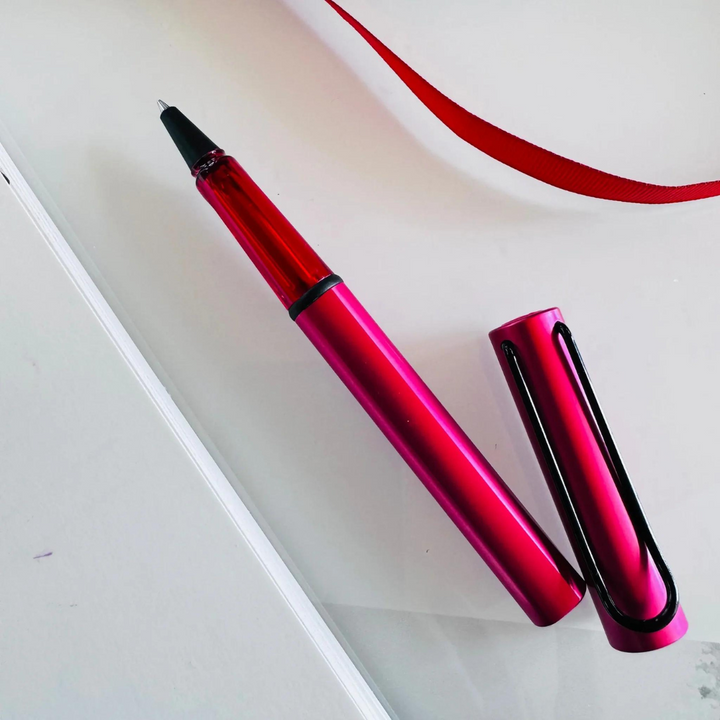 LAMY AL-Star Rollerball Pen in Fiery — Lamy rollerball pen — fluid gel ink writing instrument, at Cityluxe Singapore