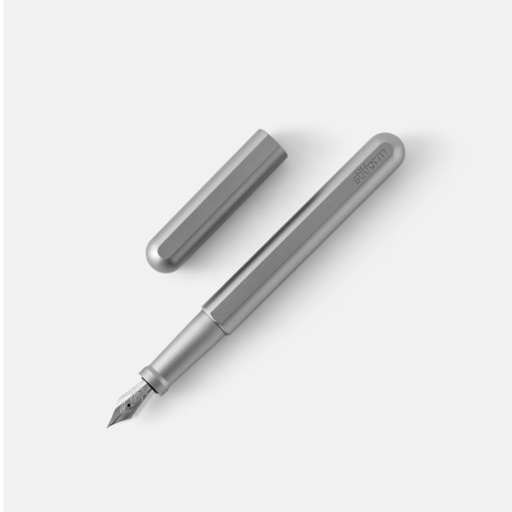 Stilform INK Comet Grey Aluminium Fountain Pen — uncapped with cap posted