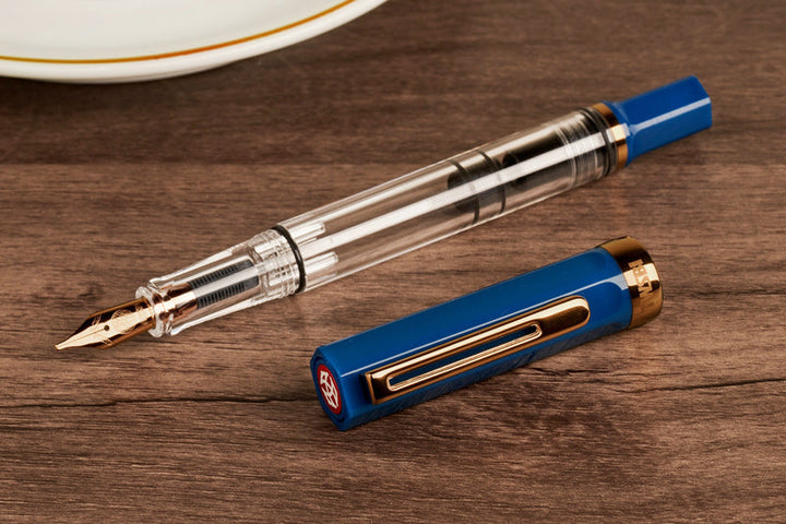 TWSBI ECO Fountain Pen - Indigo Blue with Bronze Trim — flat lay