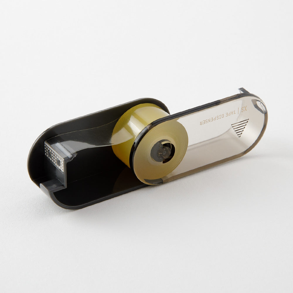 Midori XS Tape Cutter and Refill — close-up