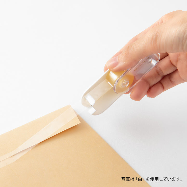 Midori XS Tape Cutter and Refill — close-up
