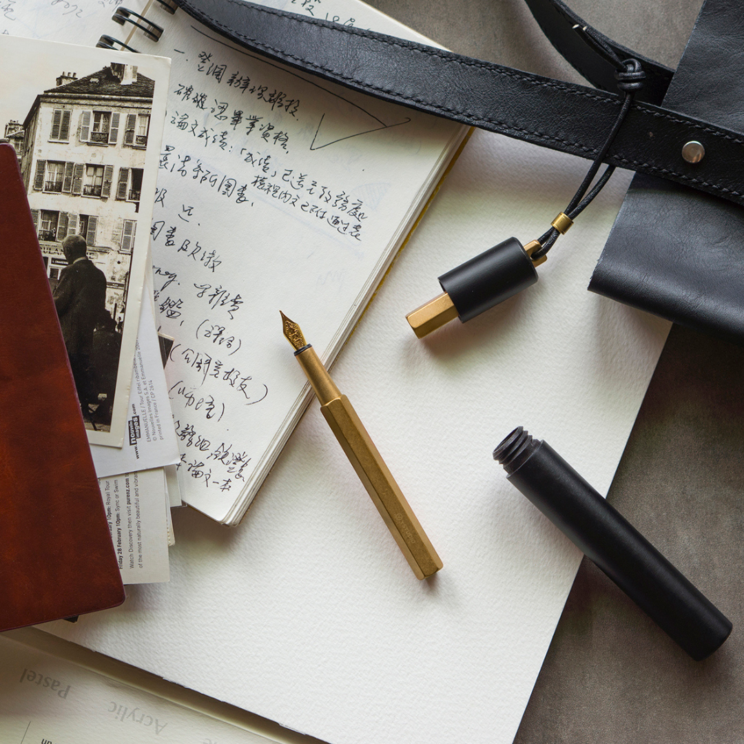 Ystudio Classic Revolve Portable Fountain Pen - Brass — writing at an angle