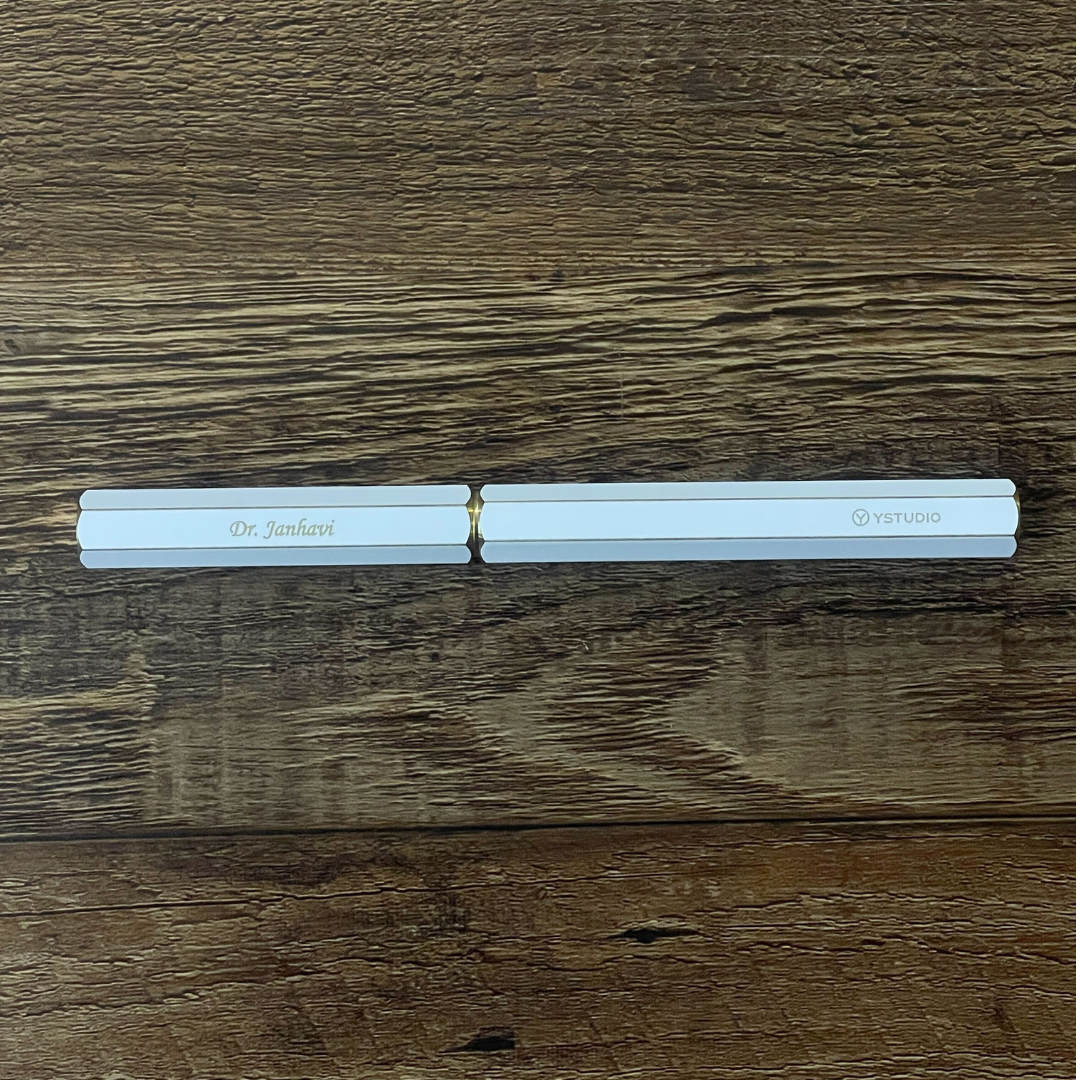 Ystudio Classic Revolve Rollerball Pen - White — flat lay