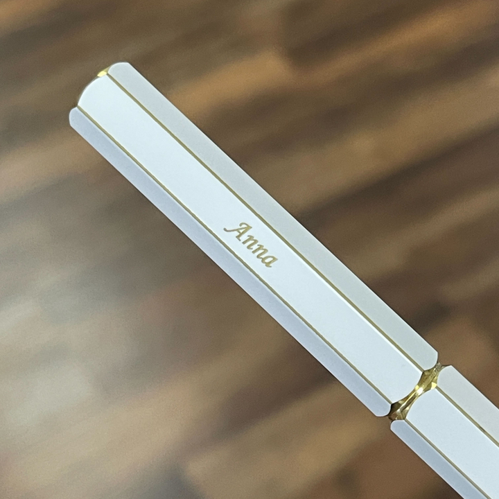 Ystudio Classic Revolve Rollerball Pen - White — flat lay