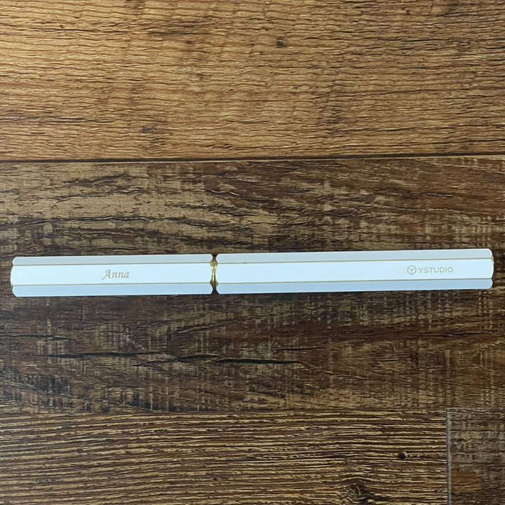 Ystudio Classic Revolve Rollerball Pen - White — flat lay