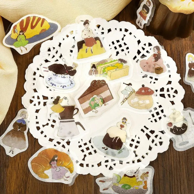BGM Foil Stamping Flake Seal – Girl and Café: Choco Milk with 45 stickers of warm-toned girls, chocolate lattes, sweets, and café details, finished with gold foil and washi texture.